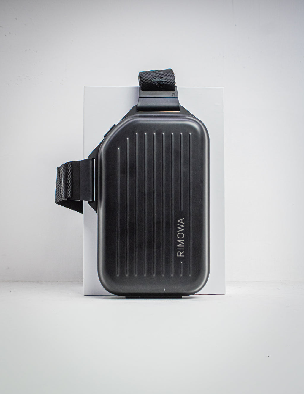 RIMOWA SLING CLUTCH
