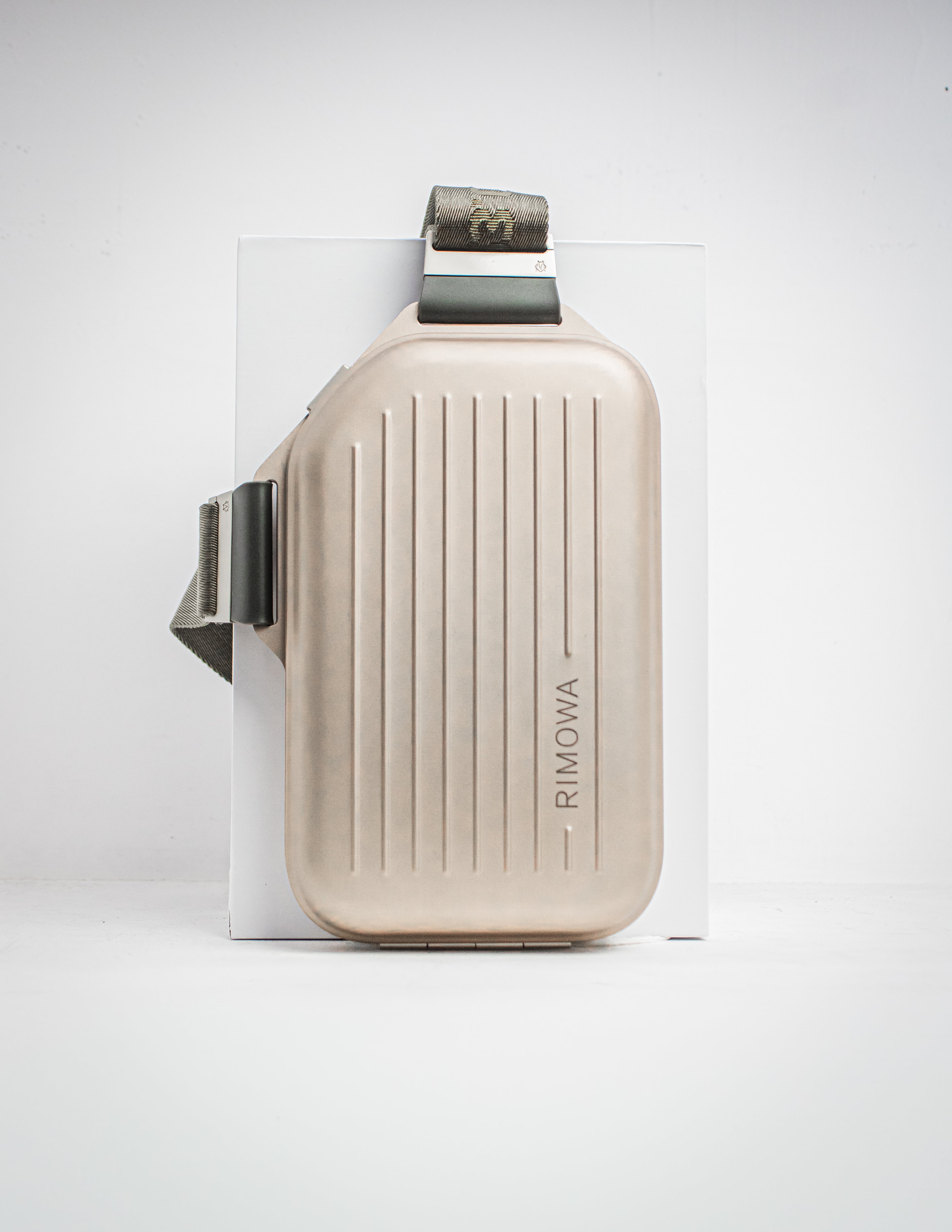 RIMOWA SLING CLUTCH